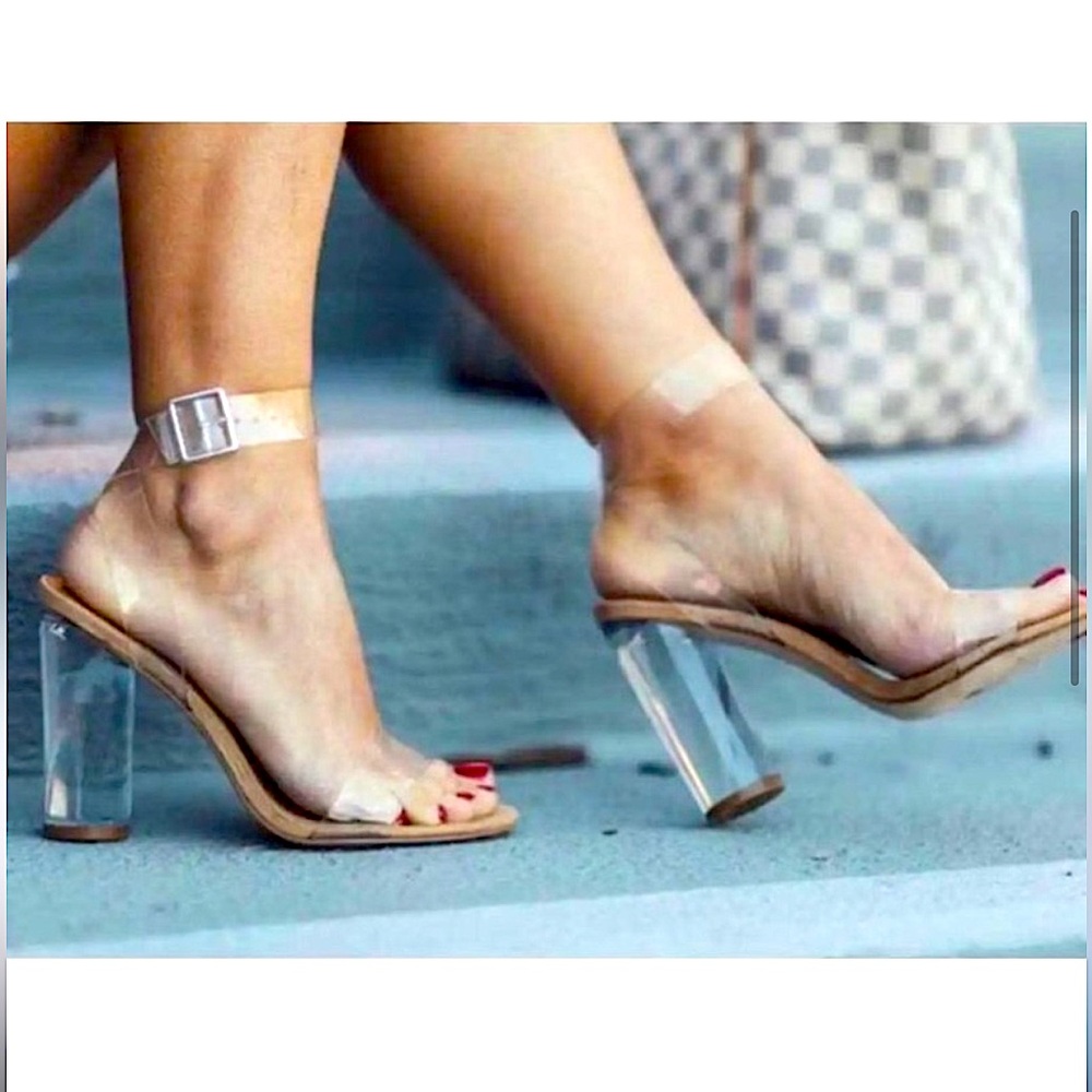 Brand new. Never worn only to try on. Beautiful clear heels/straps.
